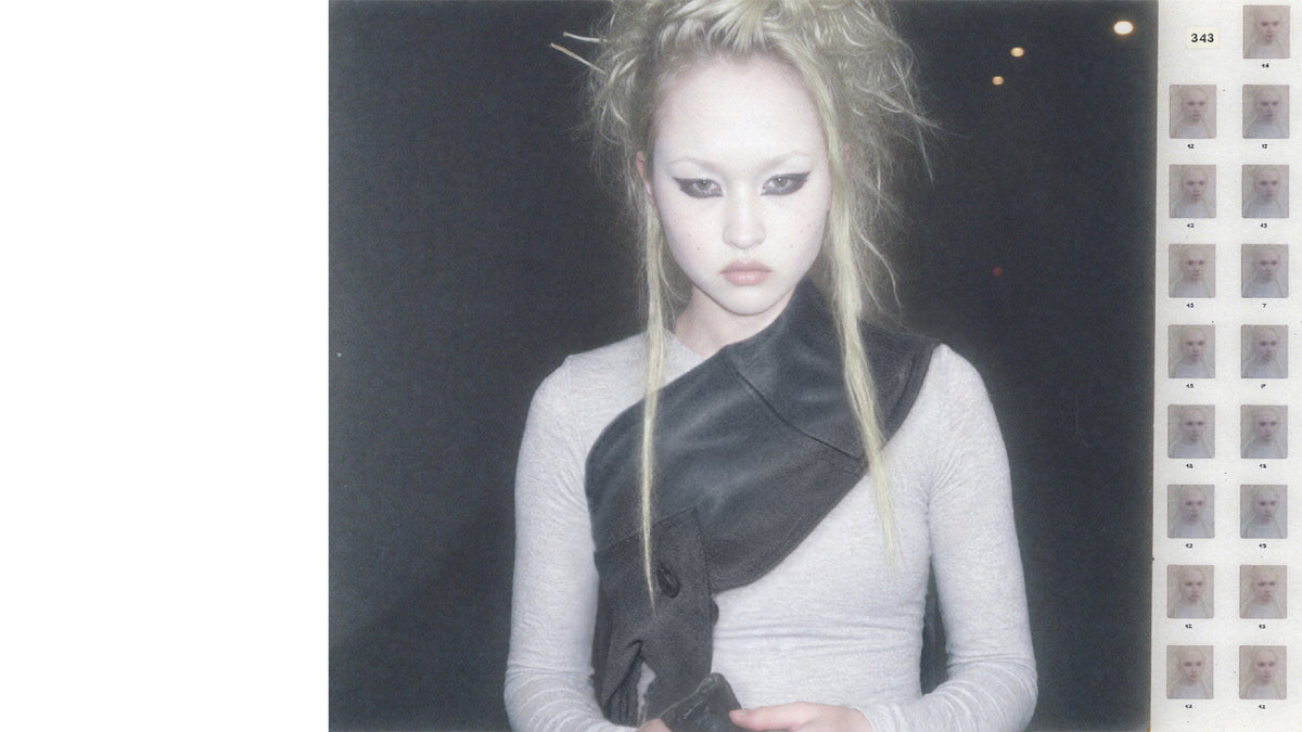 offline skin 01 campaign — utility wraparound worn across the body